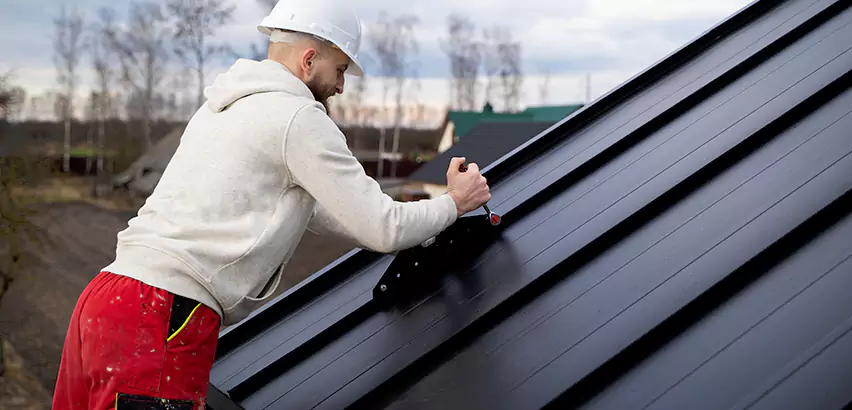 Tin Roof Ridge Cap Installation in Port Chester